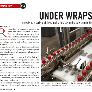 A vertical shrinkwrapping machine wraps beverage multipacks; rows of red-capped control switches are visible beside the conveyor belt.