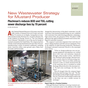 Industrial equipment in a food processing facility, with pipes and tanks, featured in a case study article about wastewater reduction strategies for a mustard producer.