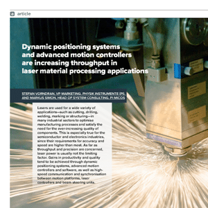 Close-up of a machine emitting bright sparks, illustrating an article about dynamic positioning systems in laser material processing applications.