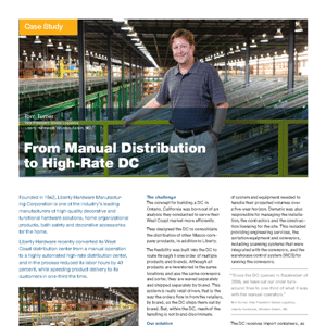 A man stands in a large warehouse with rows of conveyor belts and green railings, featured in a case study about distribution systems.